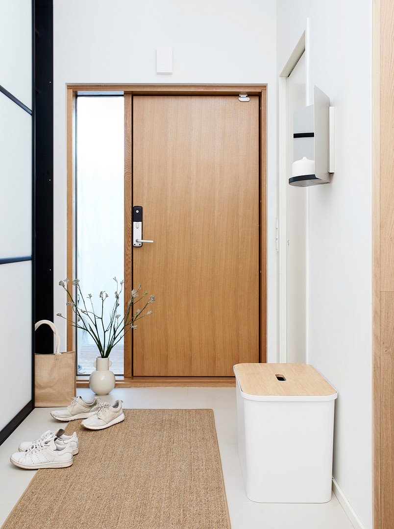 SmartStore Collect 76 L recycling bin in a hallway