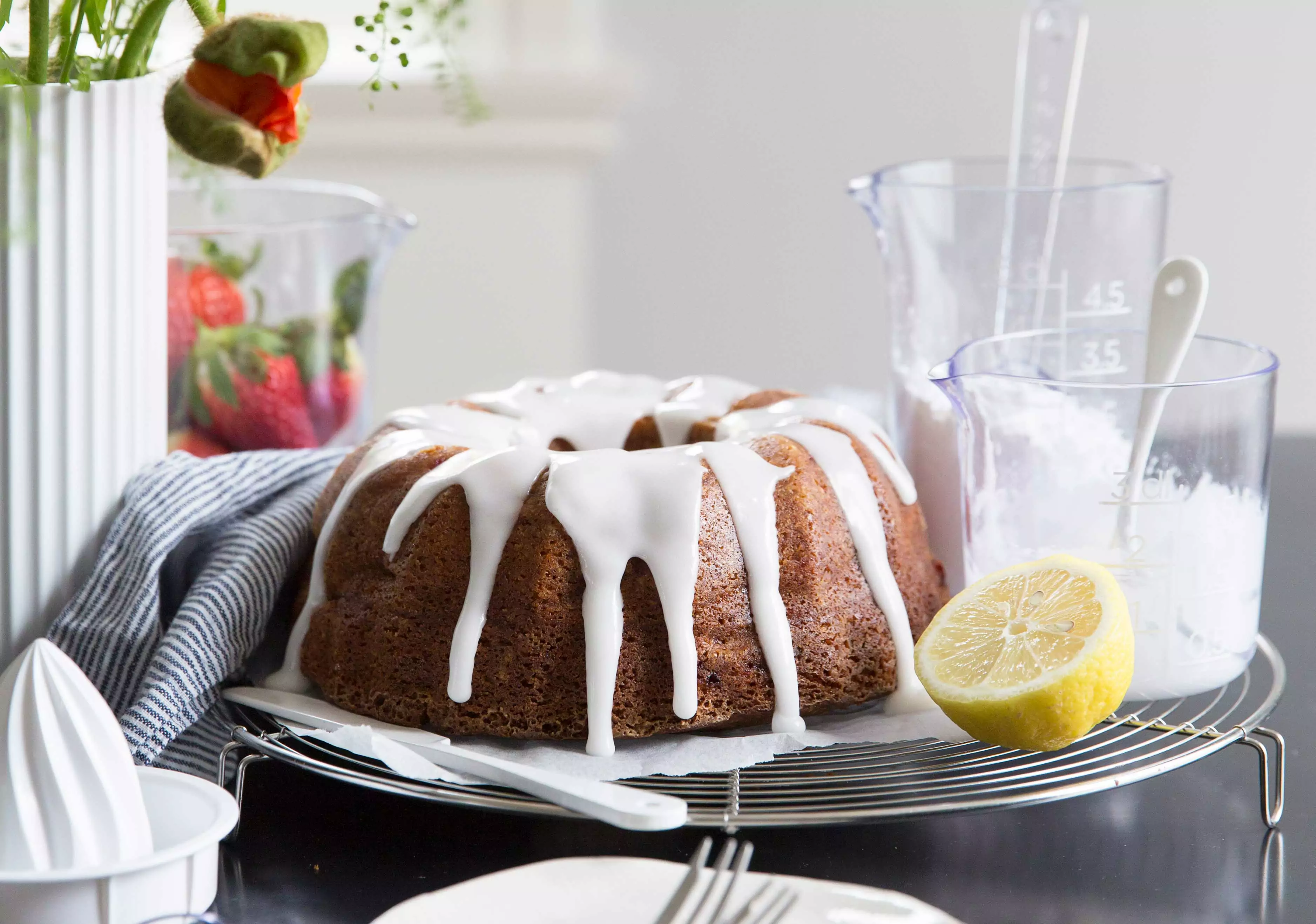 Yoghurt cake with strawberries and lemon glaze